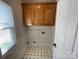 Laundry room with shelving and tile floor at 103 Berea Baptist Church Rd, Stanfield, NC 28163