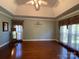Large main bedroom with hardwood floors and tray ceiling at 103 Berea Baptist Church Rd, Stanfield, NC 28163