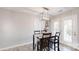 Dining area with table and chairs near back door at 4814 Bonnie Brook Ct, Vale, NC 28168