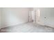 Spacious bedroom with neutral carpeting and access to bathroom at 5107 Heathland Dr # 49, Charlotte, NC 28215