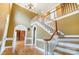 Grand entryway with hardwood floors and a curved staircase at 117 Kanawha St, Fort Mill, SC 29715