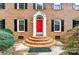 Brick home with a red front door and black shutters at 117 Kanawha St, Fort Mill, SC 29715