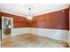 Bright dining room with hardwood floors and elegant wainscoting at 117 Kanawha St, Fort Mill, SC 29715