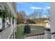 Peaceful backyard with a large lawn and an old barn at 104 Leslie Loop, Mooresville, NC 28115