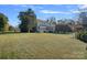 Large backyard with a view of the home at 104 Leslie Loop, Mooresville, NC 28115