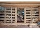Unfinished basement with exposed beams and wooden stairs at 104 Leslie Loop, Mooresville, NC 28115
