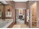 Luxurious bathroom with a soaking tub, shower, and sitting area at 104 Leslie Loop, Mooresville, NC 28115