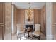 Cozy sitting area with fireplace and built-in closets at 104 Leslie Loop, Mooresville, NC 28115