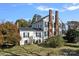 Two-story home with brick chimneys and dormers at 104 Leslie Loop, Mooresville, NC 28115