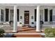 Elegant front porch with columns and period details at 104 Leslie Loop, Mooresville, NC 28115