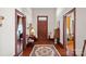 Classic interior hallway with hardwood floors and antique furniture at 104 Leslie Loop, Mooresville, NC 28115