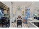 White kitchen with center island, copper cookware and blue accents at 104 Leslie Loop, Mooresville, NC 28115
