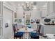 Charming kitchen with white cabinets, breakfast nook and window seat at 104 Leslie Loop, Mooresville, NC 28115
