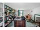 Charming library with built-in bookshelves and comfortable seating at 104 Leslie Loop, Mooresville, NC 28115