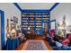 Charming library with built-in bookshelves and comfortable seating at 104 Leslie Loop, Mooresville, NC 28115