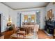 Spacious living room with hardwood floors, fireplace and French doors at 104 Leslie Loop, Mooresville, NC 28115