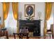 Elegant living room with fireplace and gold curtains at 104 Leslie Loop, Mooresville, NC 28115