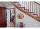 Elegant wooden staircase with a detailed banister at 104 Leslie Loop, Mooresville, NC 28115