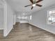 Open living room with kitchen view and wood-look floors at 728 Jefferson Ave, Rock Hill, SC 29730
