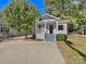 Charming house with a front porch and well-maintained landscaping at 728 Jefferson Ave, Rock Hill, SC 29730