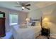 Bedroom with a queen-size bed and ceiling fan at 6170 Hopewell Rd, Hickory Grove, SC 29717