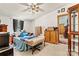 Bedroom with ceiling fan and wood floors at 7670 Hickory Creek Dr # 20, Denver, NC 28037