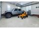 Garage with epoxy floor and overhead storage at 11411 Home Place Ln, Mint Hill, NC 28227