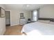 Primary bedroom with queen bed and dresser at 130 Shiloh Rd, Troy, NC 27371