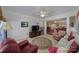 Living area with tiled floor, comfortable seating and view to dining area at 26508 Sandpiper Ct, Fort Mill, SC 29707