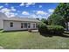Spacious backyard with a patio and lush lawn at 26508 Sandpiper Ct, Fort Mill, SC 29707
