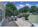 Brick paved patio with seating area and grill at 26508 Sandpiper Ct, Fort Mill, SC 29707