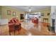 Spacious living room featuring hardwood floors, fireplace and comfortable seating at 26508 Sandpiper Ct, Fort Mill, SC 29707