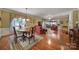 Bright dining room with hardwood floors and a charming table setting at 26508 Sandpiper Ct, Fort Mill, SC 29707