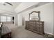 Main bedroom with dresser and access to other rooms at 1568 Whitman Ct, York, SC 29745