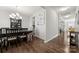Formal dining room with dark wood table and hardwood floors at 1568 Whitman Ct, York, SC 29745