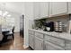 Gray kitchen cabinets, granite counters, and coffee bar at 1568 Whitman Ct, York, SC 29745