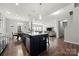 Open concept kitchen with island and stainless steel appliances at 1568 Whitman Ct, York, SC 29745