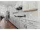 Modern kitchen featuring gray cabinets, granite countertops, and stainless steel appliances at 1568 Whitman Ct, York, SC 29745