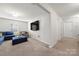 Bright hallway with neutral walls and carpet, leading to other rooms at 1568 Whitman Ct, York, SC 29745