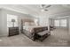 Main bedroom with king-size bed and sitting area at 1568 Whitman Ct, York, SC 29745