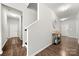 Bright entryway with staircase, hardwood floors and built-in bench seating at 1568 Whitman Ct, York, SC 29745