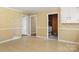 Bright dining room with hardwood floors and access to kitchen at 1102 W Elm St, Shelby, NC 28152