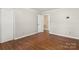 Bright bedroom with hardwood floors and ample closet space at 1102 W Elm St, Shelby, NC 28152