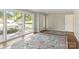 Living room with hardwood floors and large windows at 1102 W Elm St, Shelby, NC 28152