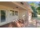 Side entrance with tiled flooring and access to garage at 1102 W Elm St, Shelby, NC 28152