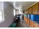 Long kitchen with ample cabinetry and window lighting at 907 Bethlehem Rd, Kings Mountain, NC 28086