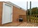 Back deck with access door and small grill at 907 Bethlehem Rd, Kings Mountain, NC 28086