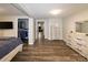Finished basement bedroom with dresser, closet, and view down hallway at 907 Bethlehem Rd, Kings Mountain, NC 28086