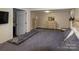 Finished basement bedroom with large bed and plenty of storage at 907 Bethlehem Rd, Kings Mountain, NC 28086