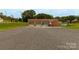 Brick firehouse building with three large garage doors and signage at 907 Bethlehem Rd, Kings Mountain, NC 28086